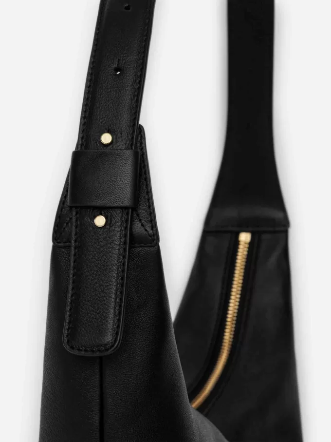 Mellemstørrelse buet skuldertaske