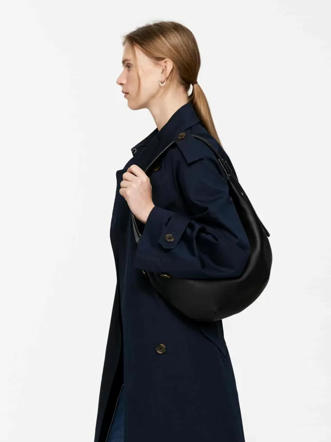 Mellemstørrelse buet skuldertaske