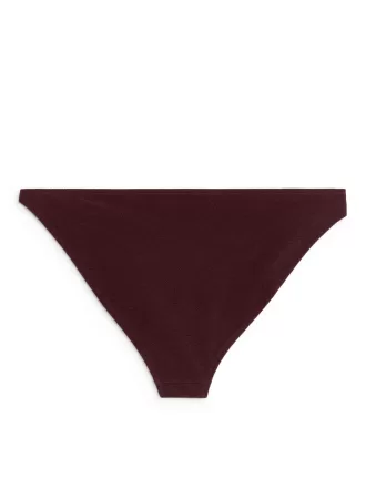 Bikiniunderdel med perledetaljer