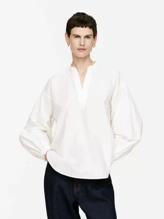 Bluse med volumenærmer