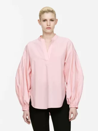 Bluse med volumenærmer