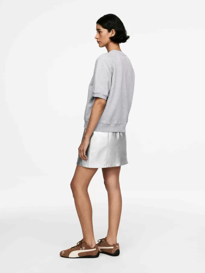 Metallisk lædernederdel