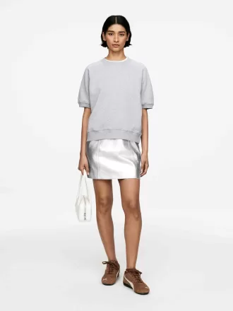 Metallisk lædernederdel