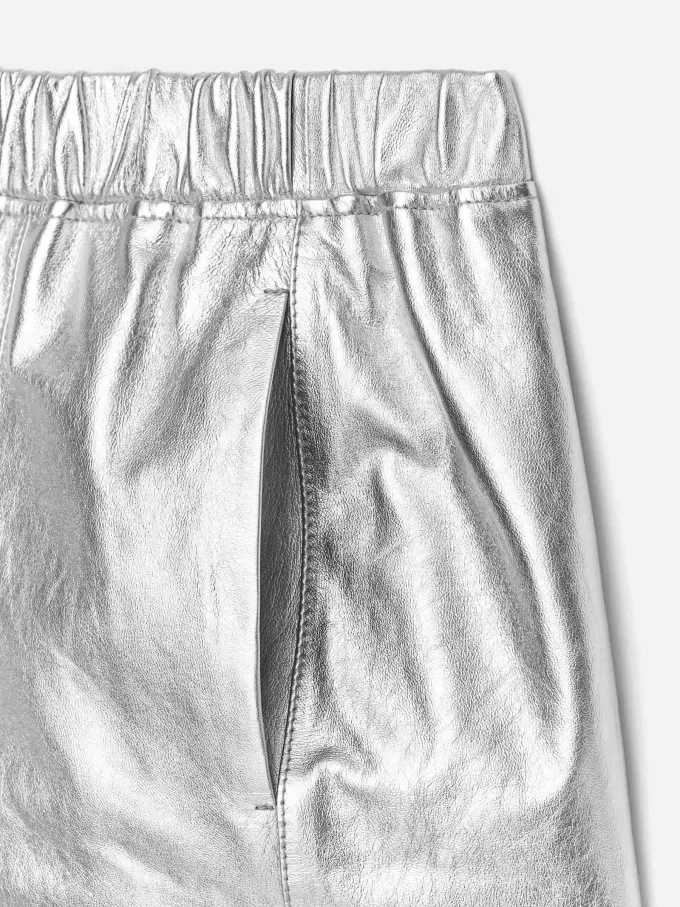 Metallisk lædernederdel