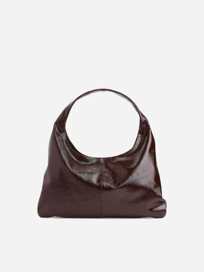 Skinnende lædertaske