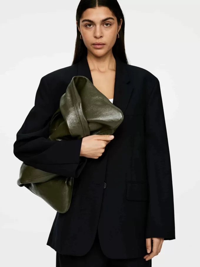 Skinnende lædertaske Skinnende lædertaske