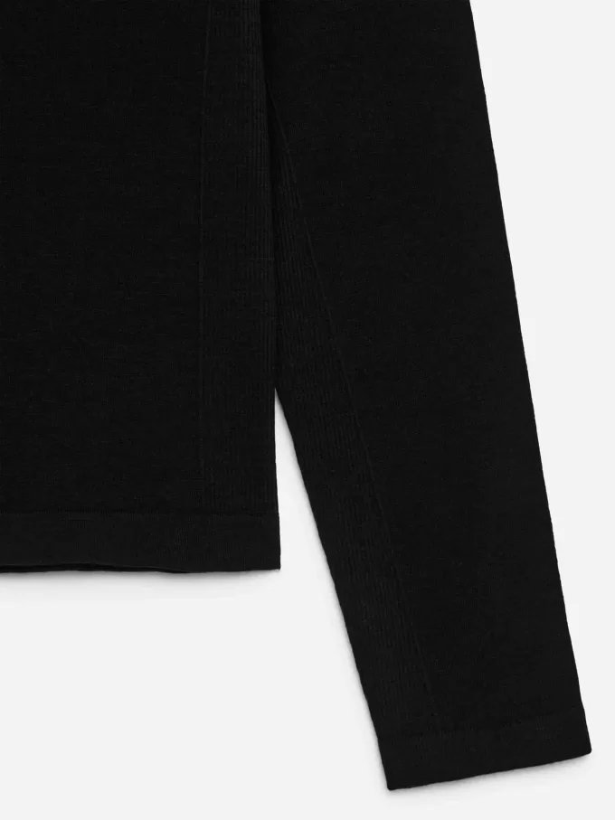 Sømløs top i uldblanding