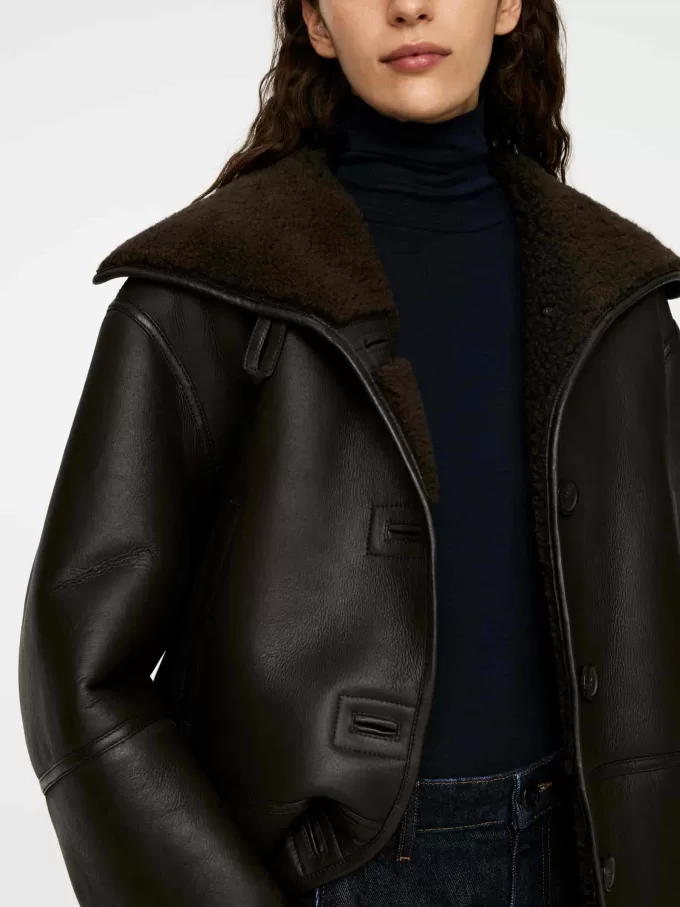 Uldtop med rullehals Uldtop med rullehals